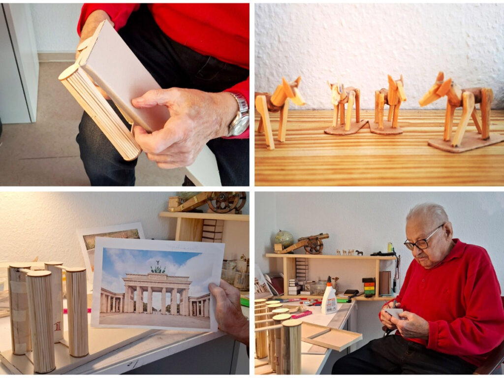 Herr Lankowski bastelt das Brandenburger Tor aus Streichhölzern und Pappe